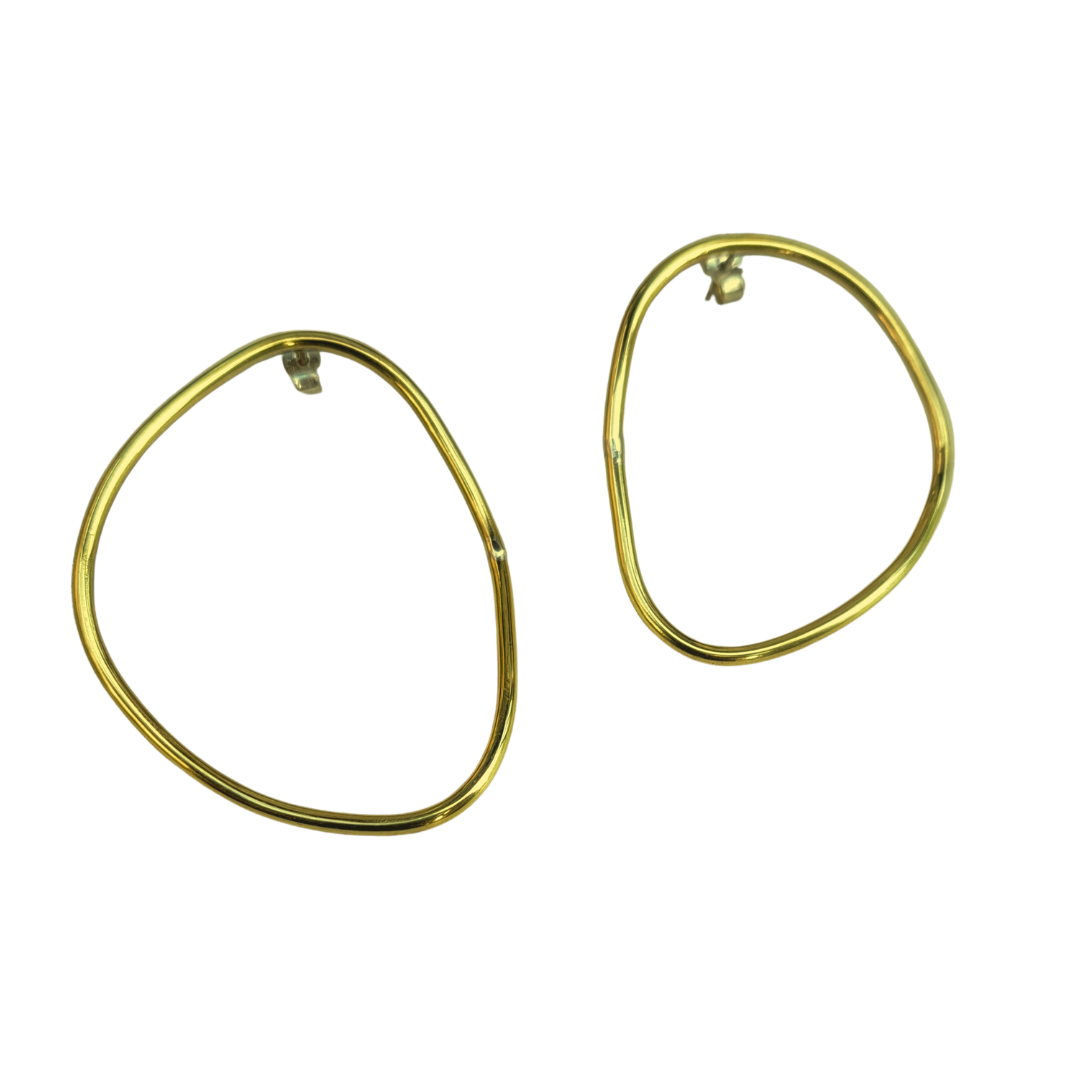 Organic asymmetrical big hoops on a white background